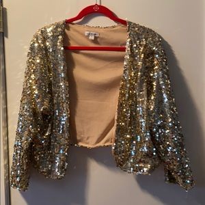 Joan Rivers sequin shrug
